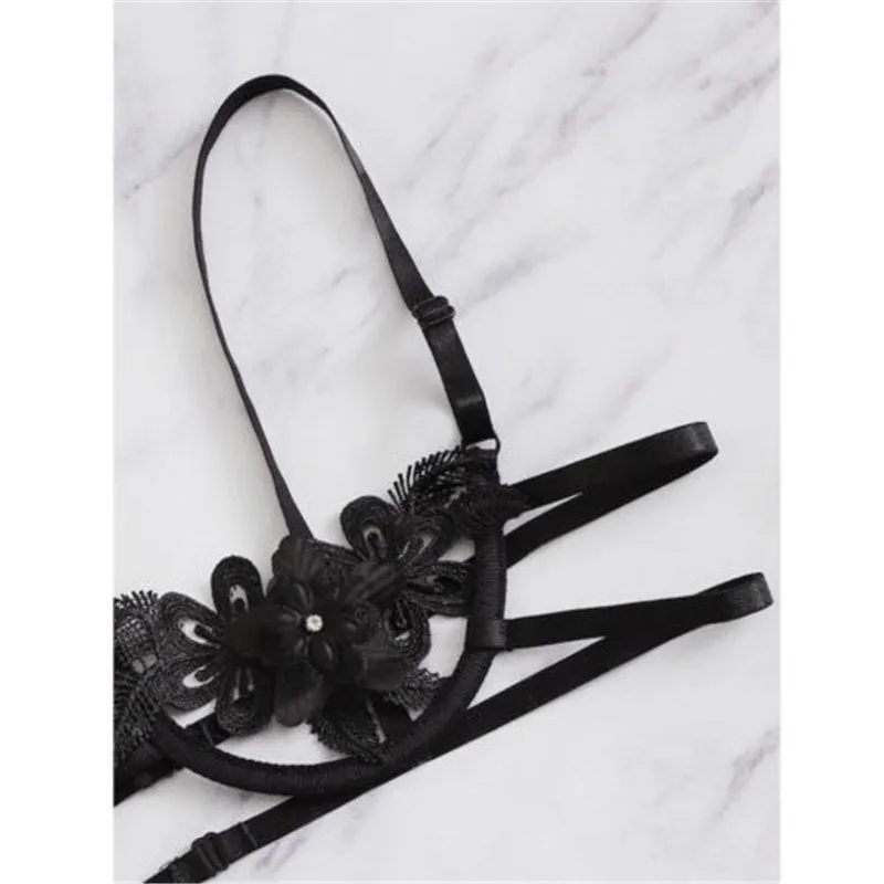 Women's black half cup unlined lingerie set with floral pattern and fitted straps