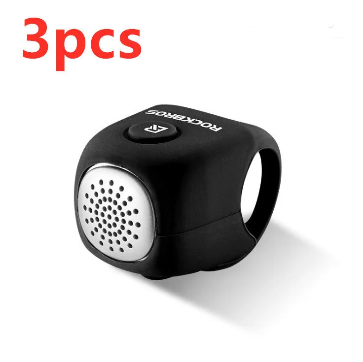 Elastic silicone driving electric horn mountain bike bell in black attached to bicycle handlebars