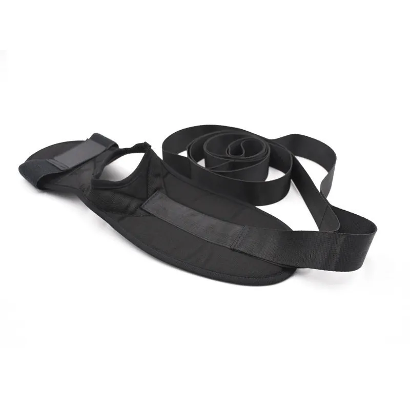 Black polyester cotton yoga stretch strap for flexibility and split training, packed on a flat surface