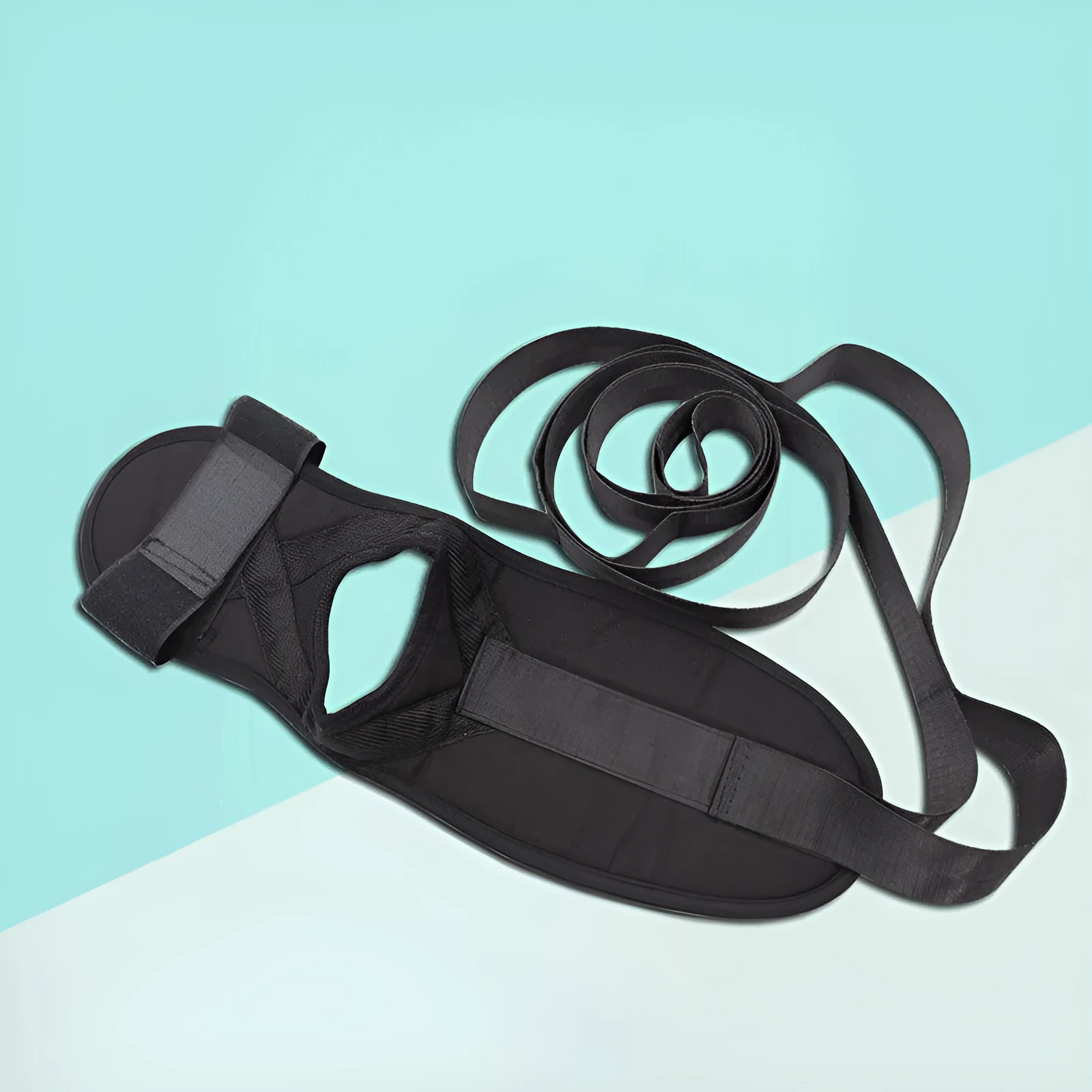 Black polyester cotton yoga stretch strap for flexibility and split training, packed on a flat surface