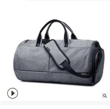 Men's black waterproof canvas gym travel bag with zipper pockets and soft handles