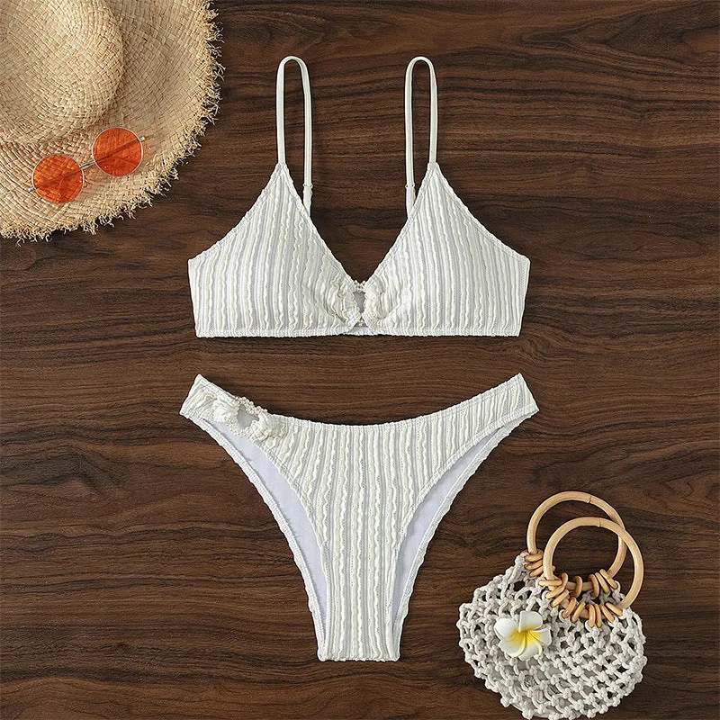 White women's V-neck sleeveless split swimsuit with top and shorts for swimming