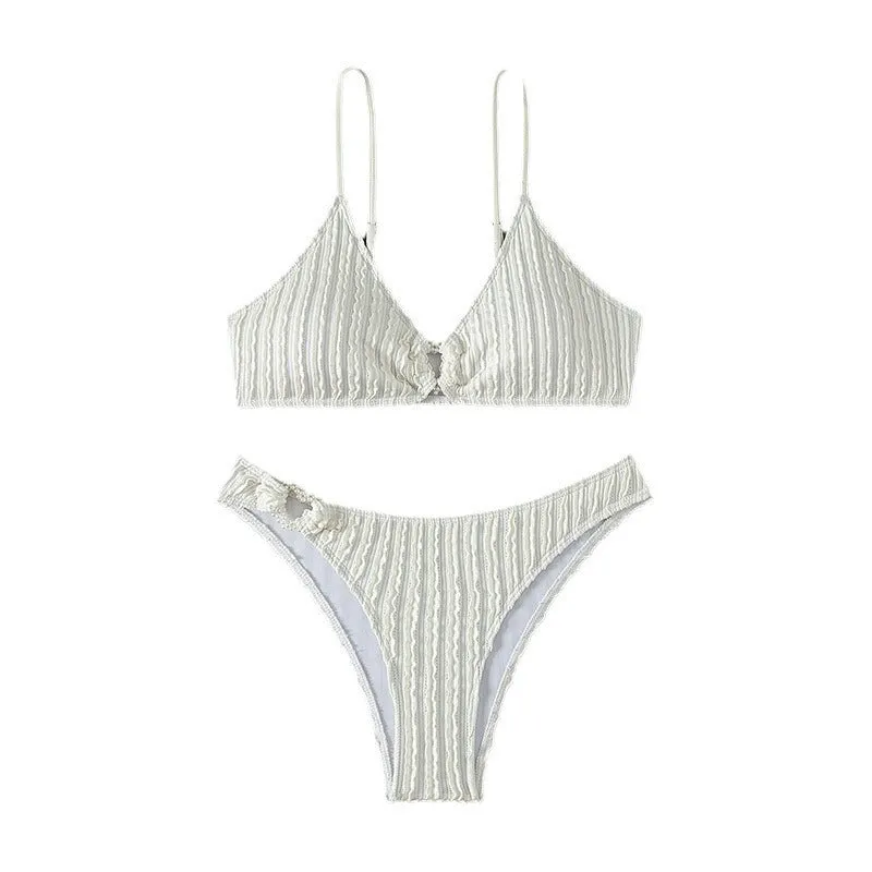 White women's V-neck sleeveless split swimsuit with top and shorts for swimming