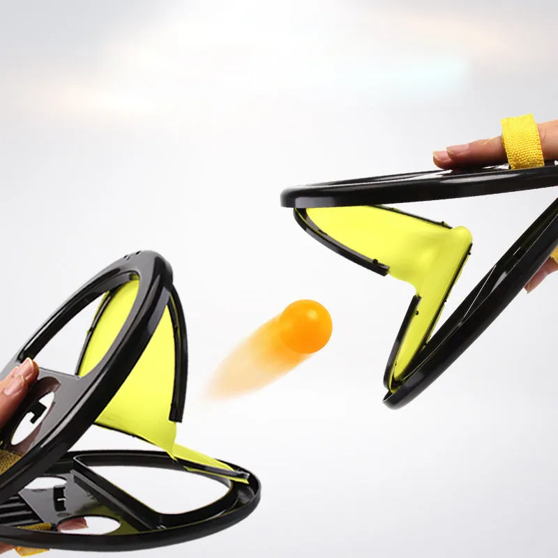 Yellow ABS hand catching ball racket with 20cm diameter surface for parent-child outdoor fitness play