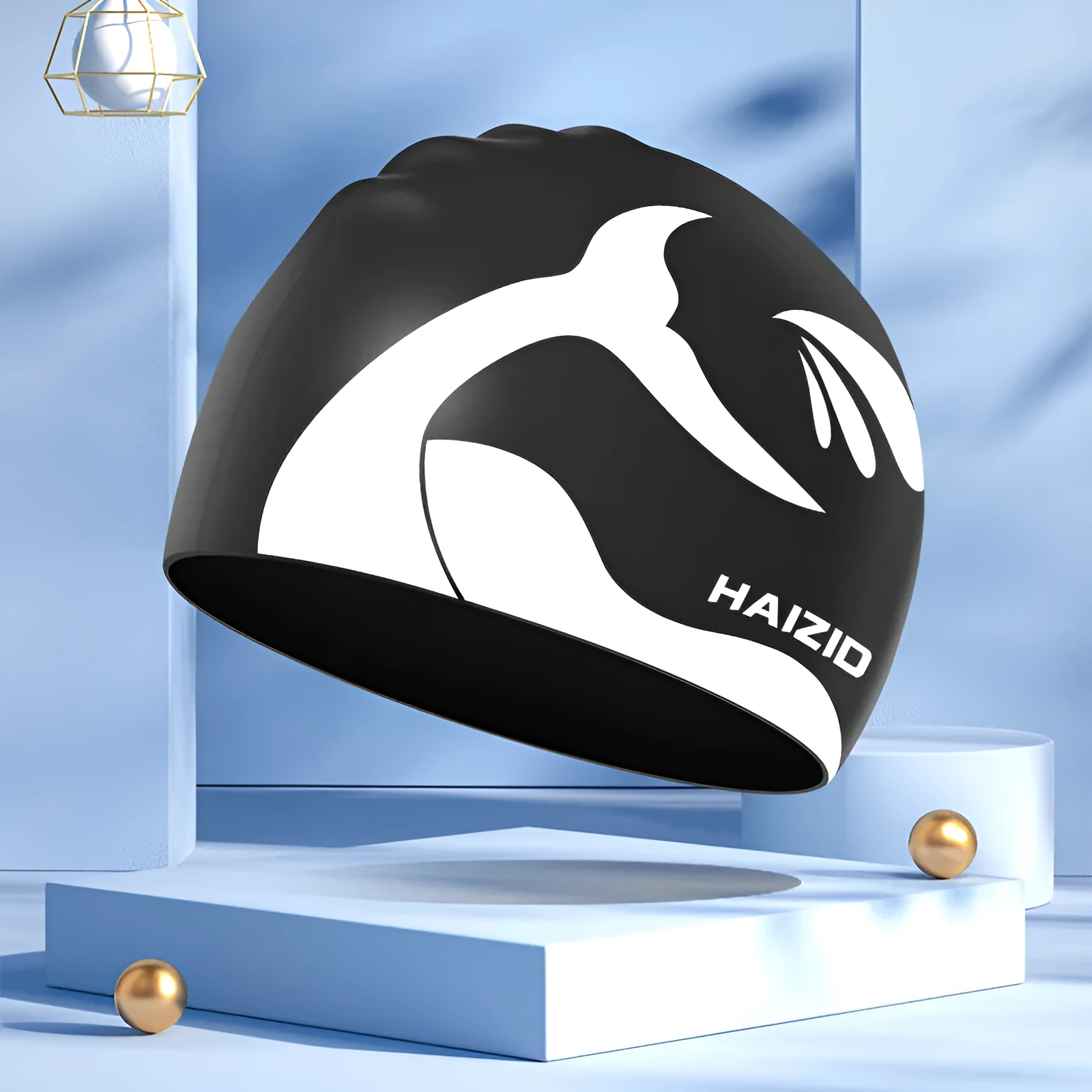 Silicone swimming cap with waterproof ear protectors showing whale tail pattern in assorted colours