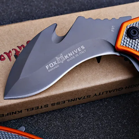 Orange folding knife with steel handle and 8.2cm blade open on outdoor surface showing total length and grip texture