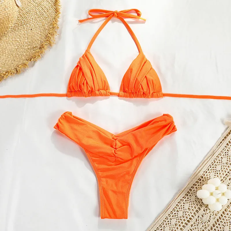Women's solid colour pleated bikini set with chest pad in nylon, available in black, blue, green, orange, pink, and yellow