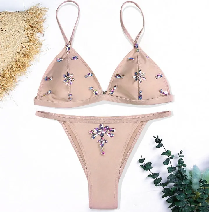 Women's pink crystal bling diamond bikini set with push-up top and Brazilian low-waist bottom on model