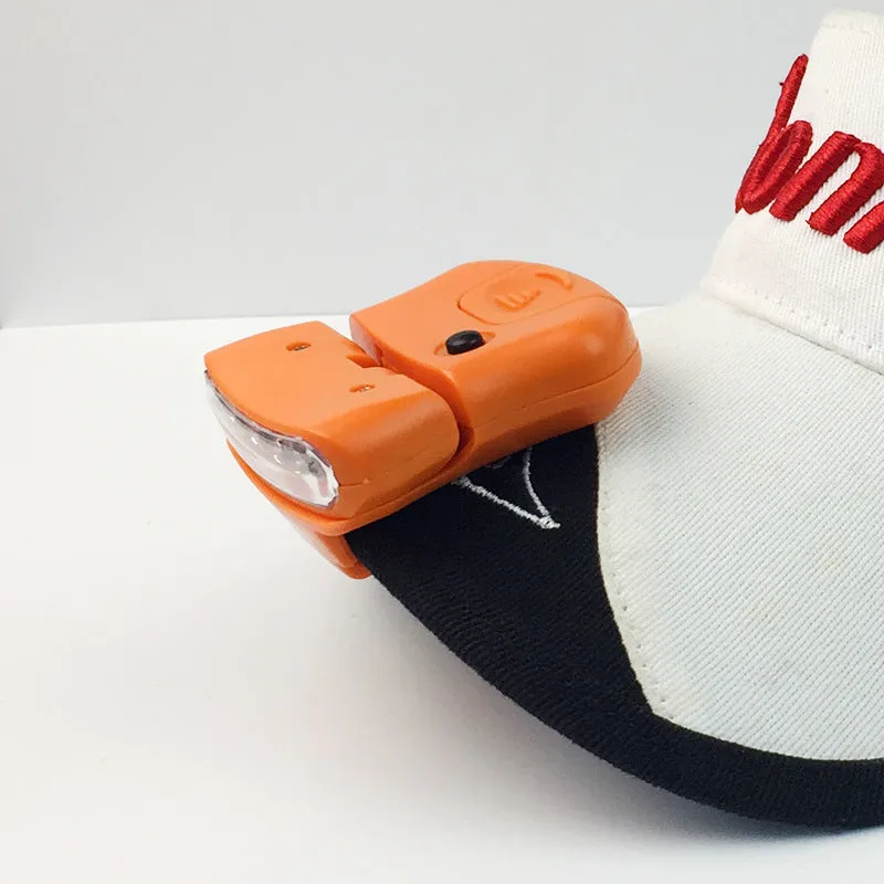 5LED ABS plastic cap lamp clipped to a cap brim, measuring 5x4.5cm, available in black or orange for outdoor use