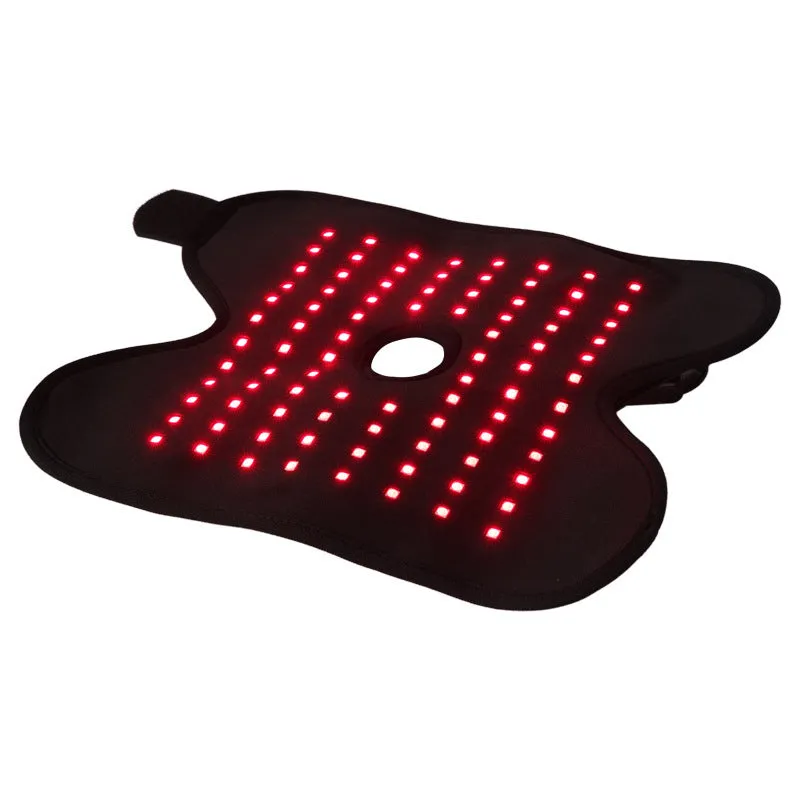 Black physical therapy ankle support with red light heat compress and USB cable
