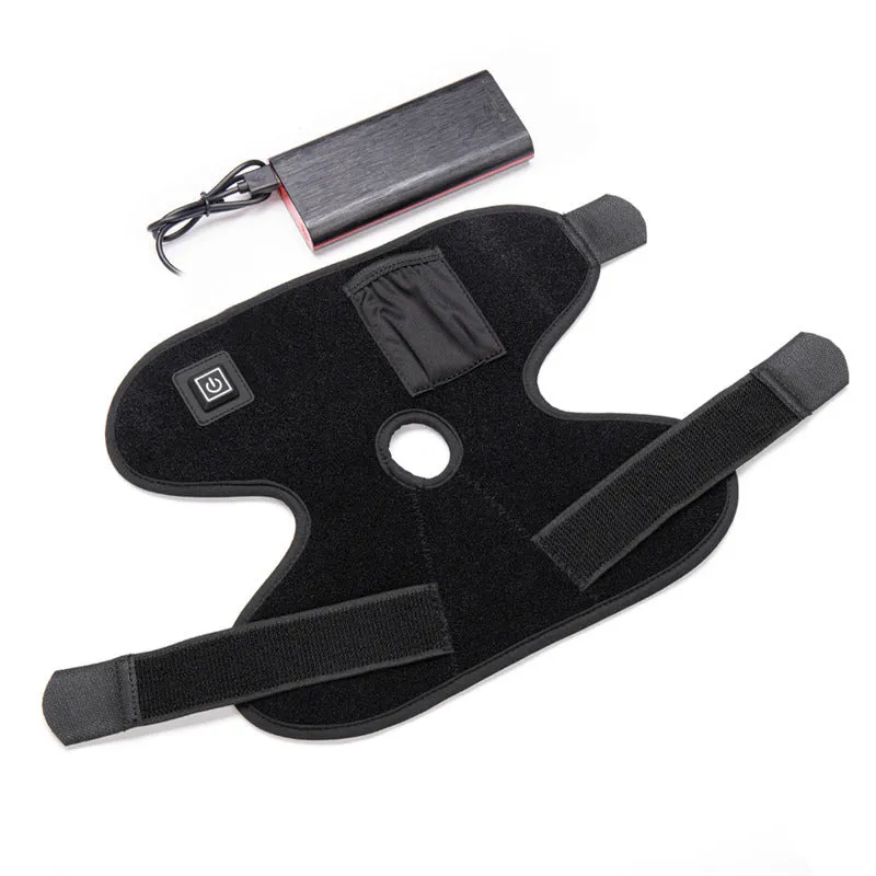 Black physical therapy ankle support with red light heat compress and USB cable