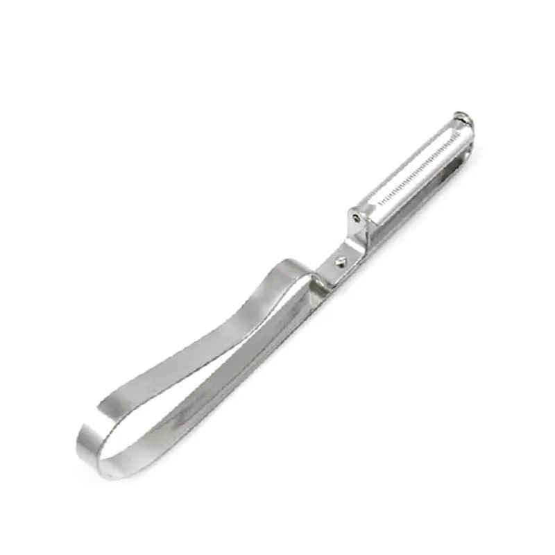 Silver stainless steel fruit and vegetable peeler on a clean kitchen counter