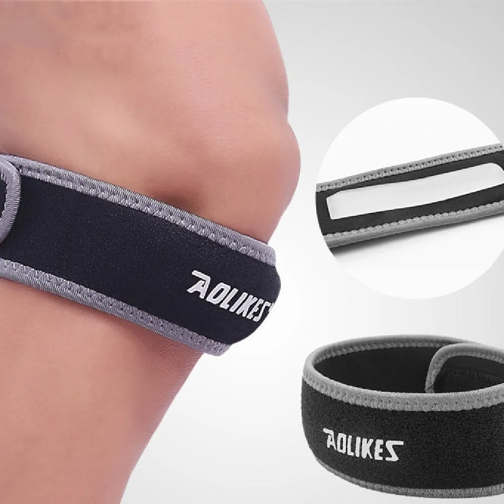 Black and grey patella retinaculum knee support for sports protection.