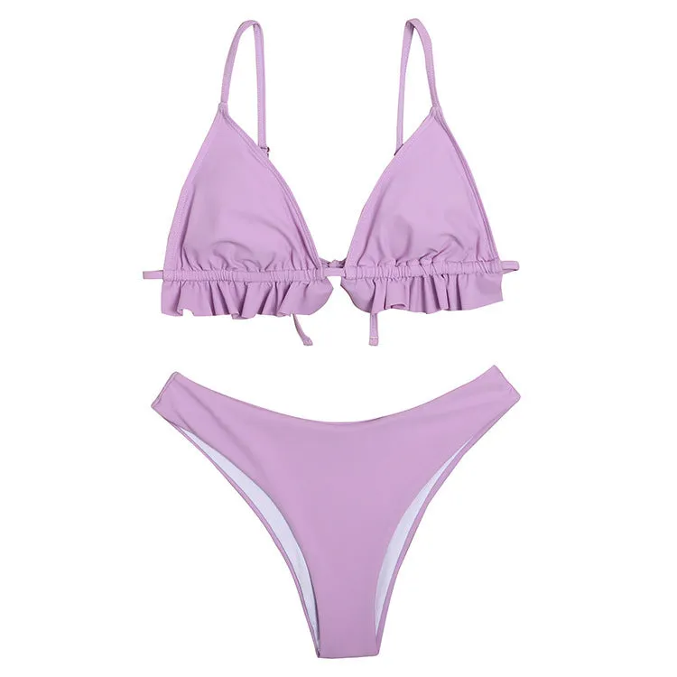 Ladies solid colour ruffled split backless swimsuit in lotus root on model