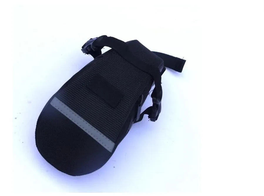 Black bicycle saddle bag made of 600D fabric with reflective strip, 20cm long, on a bike saddle
