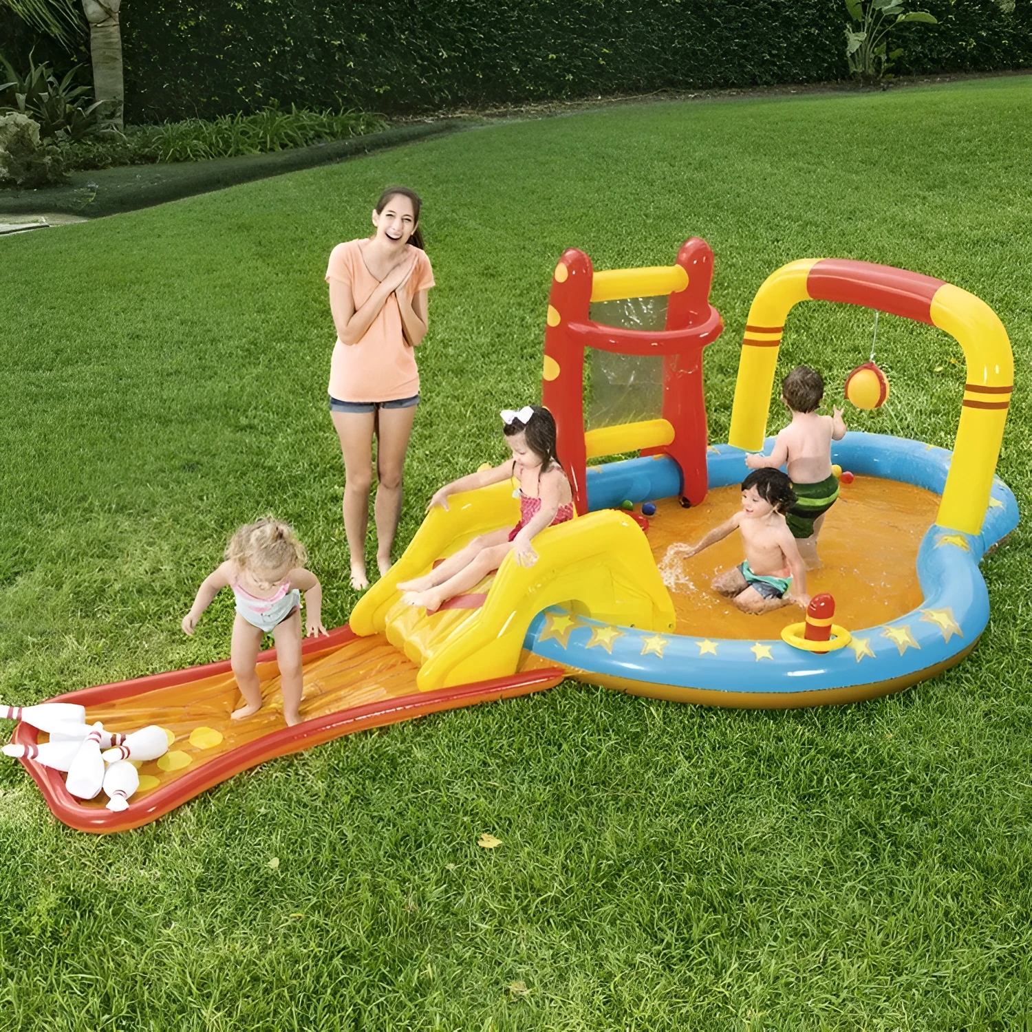 Inflatable PVC children's paddling pool 435x213x117cm in bowling water park design, deflated on grass