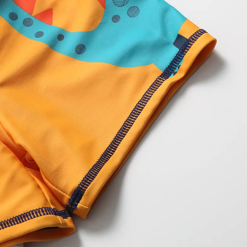 Cartoon dinosaur swimming trunks set for boys in light blue, dark blue, and orange colours