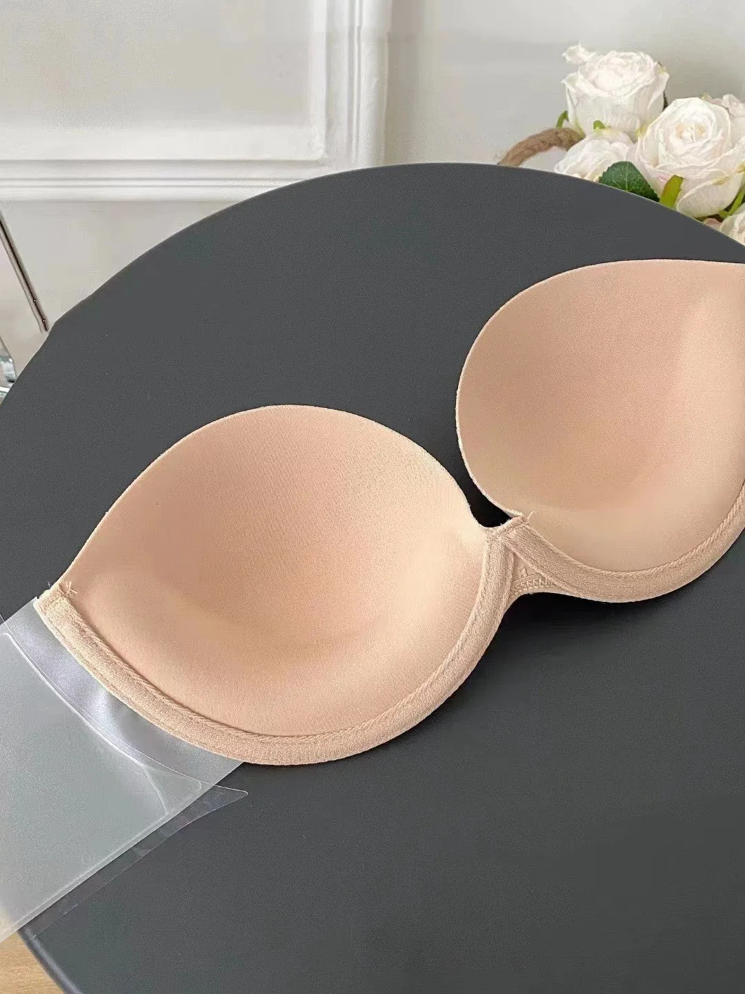 Strapless adhesive push up bra in skin colour with cotton lined mould cup and steel ring