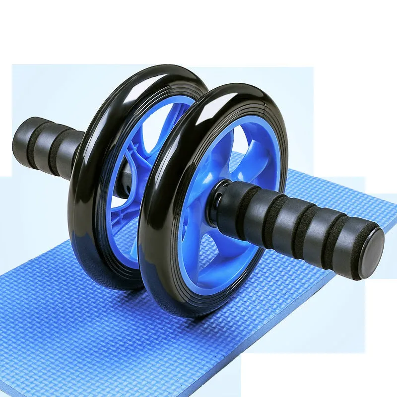 Silent abdominal wheel with kneeling pad, black colour, 165mm diameter, on a gym mat