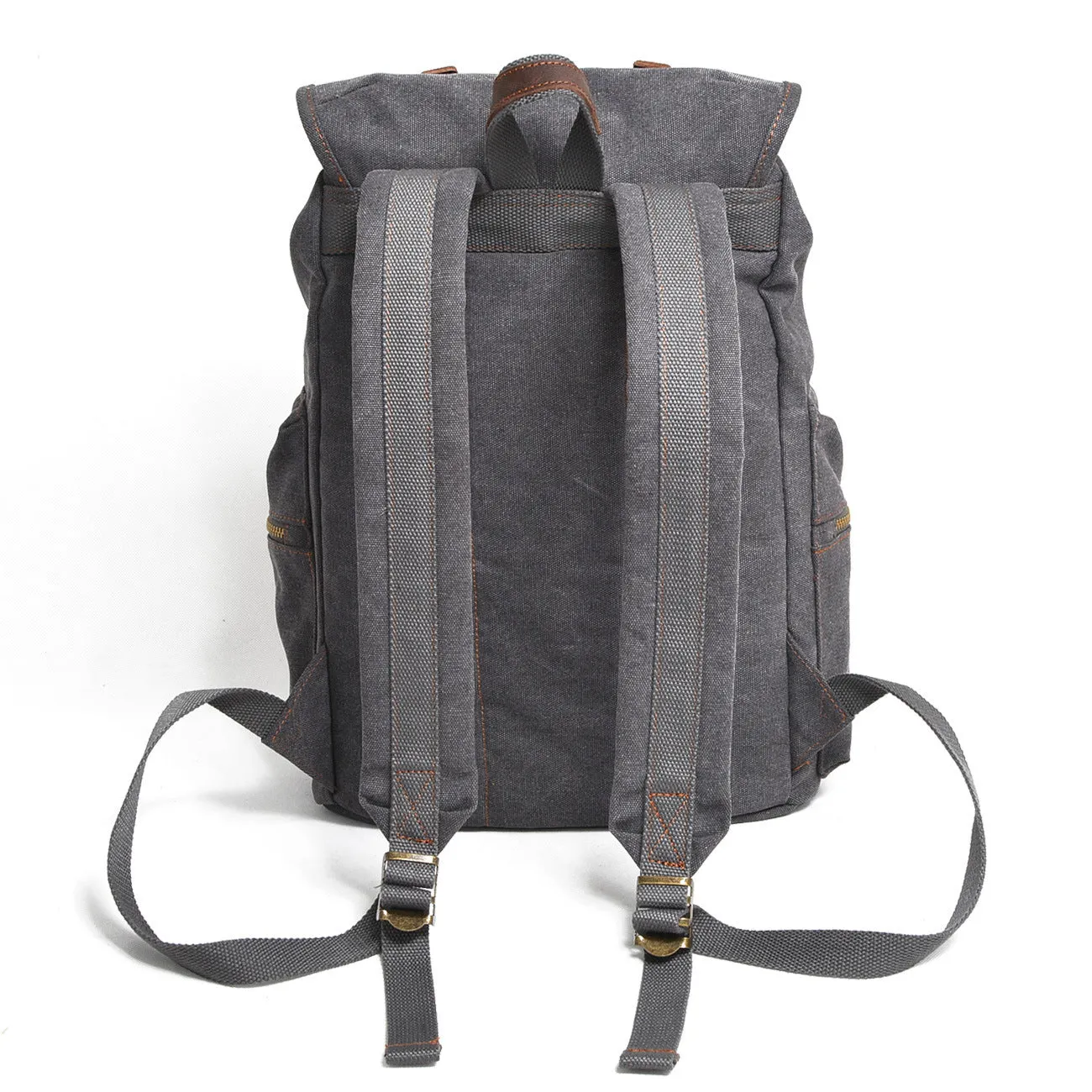 Canvas casual backpack with crazy horse leather trim in brown side view showing main compartment and shoulder strap