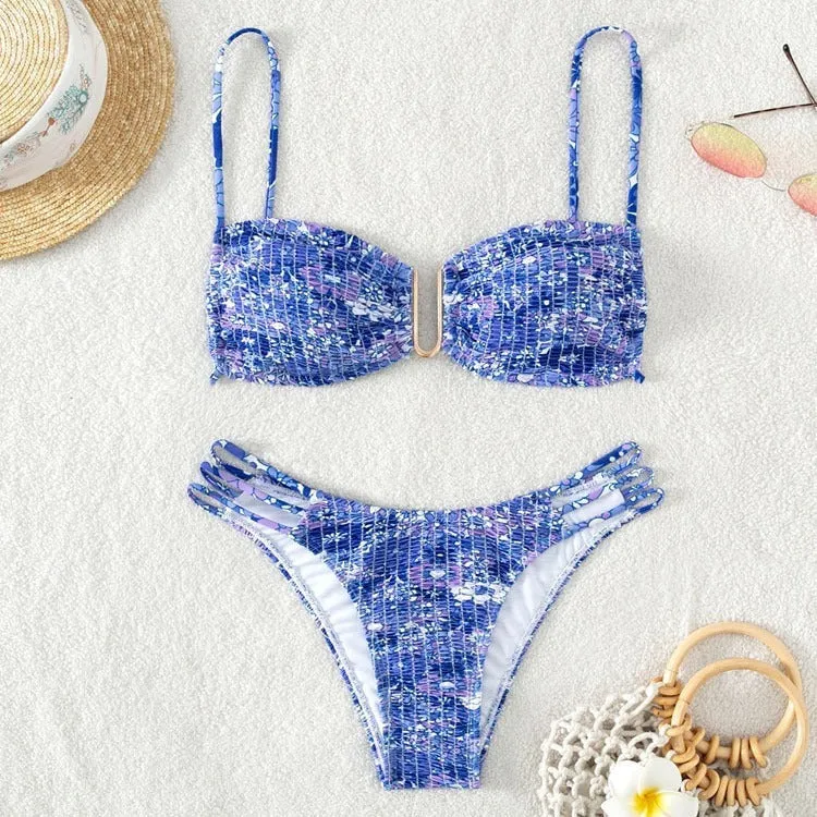 Women's floral bikini swimsuit with high-waist briefs in solid colour patterns