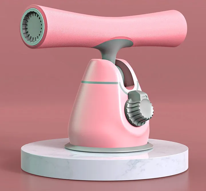 Women's sit-up aid with suction cup base, thick foam foot pad, and adjustable height mechanism on a home floor