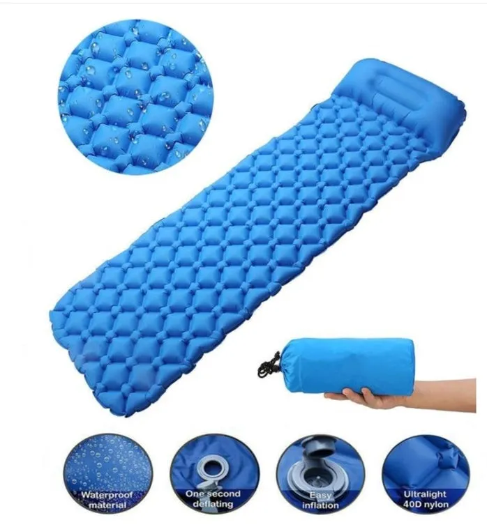 Outdoor inflatable camping mat with pillow in Army Green on grass