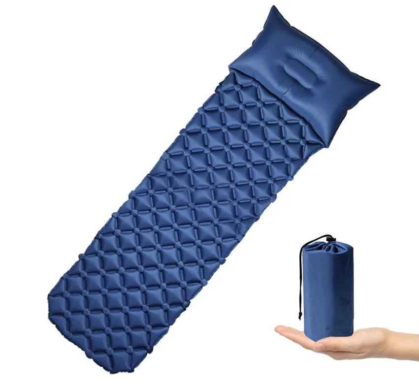Outdoor inflatable camping mat with pillow in Army Green on grass