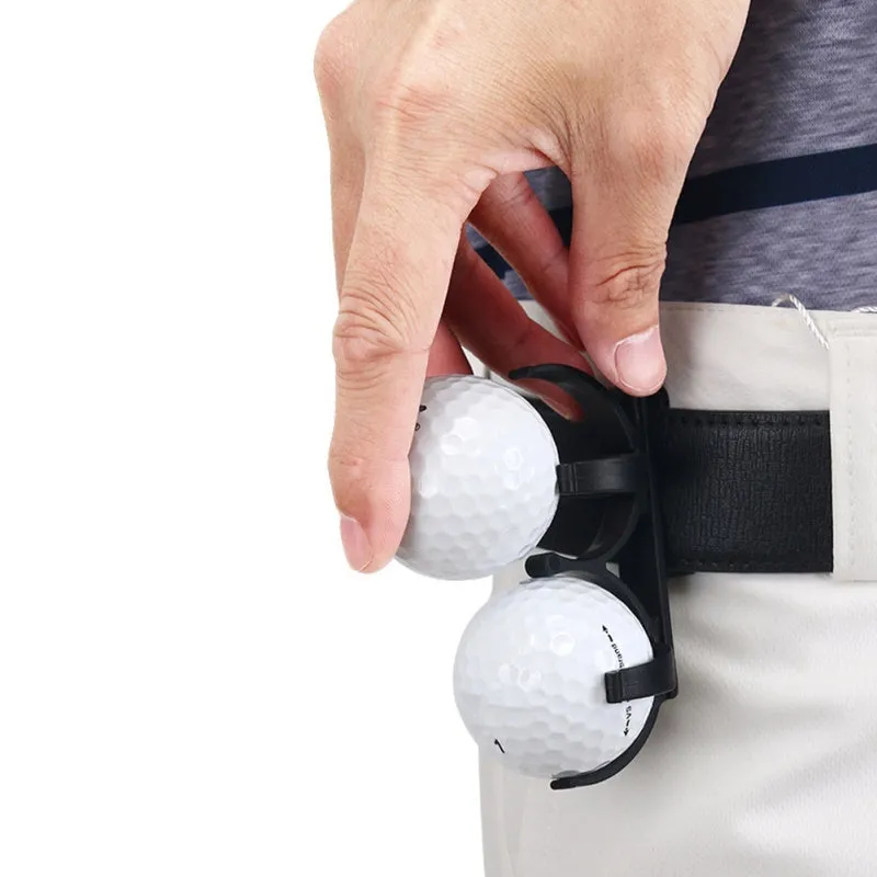 Black plastic golf ball holder clip for belt or bag, holds two golf balls, approx 8 x 4.2 x 1cm