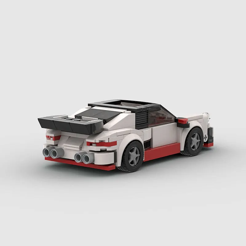 Small particle plastic building blocks model of a cool convertible sports car on a table