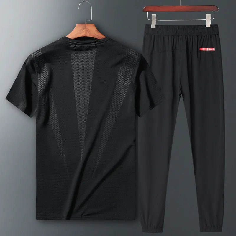 Two-piece short-sleeved sportswear set in black with round neck and nylon fabric