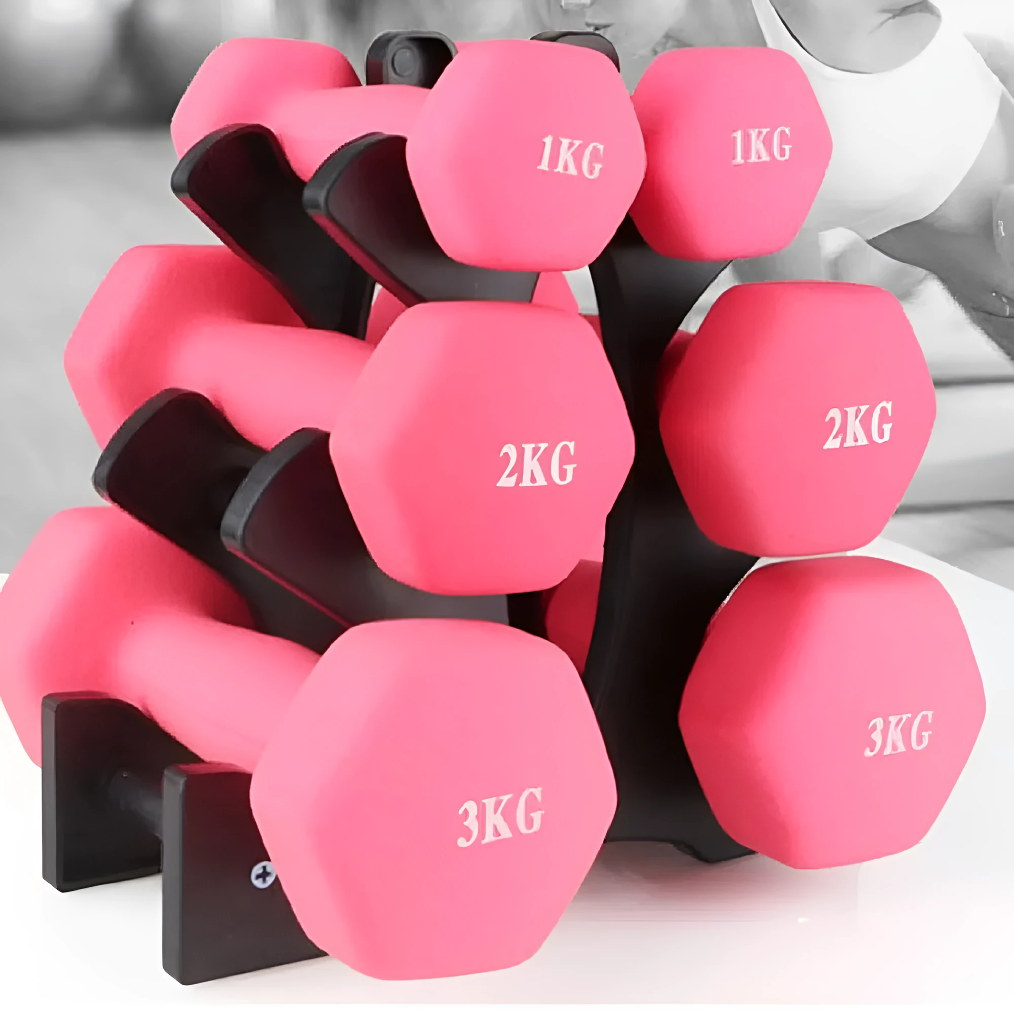 PVC fitness dumbbell rack holder stand for home gym storage with dumbbells placed on it.