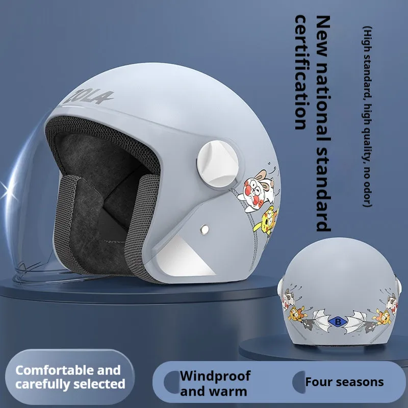 Blue winter electric bicycle helmet with attached fleece scarf and clear anti-fog visor on handlebars.