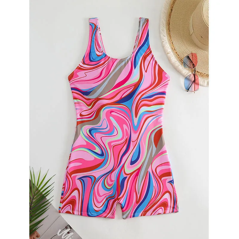 Women's high-waisted backless one-piece swimsuit with a printed pattern.