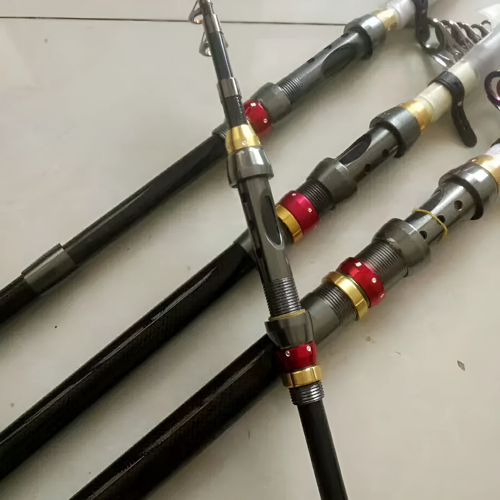 Carbon fibre telescopic spinning fishing rod for sea fishing with metal handle
