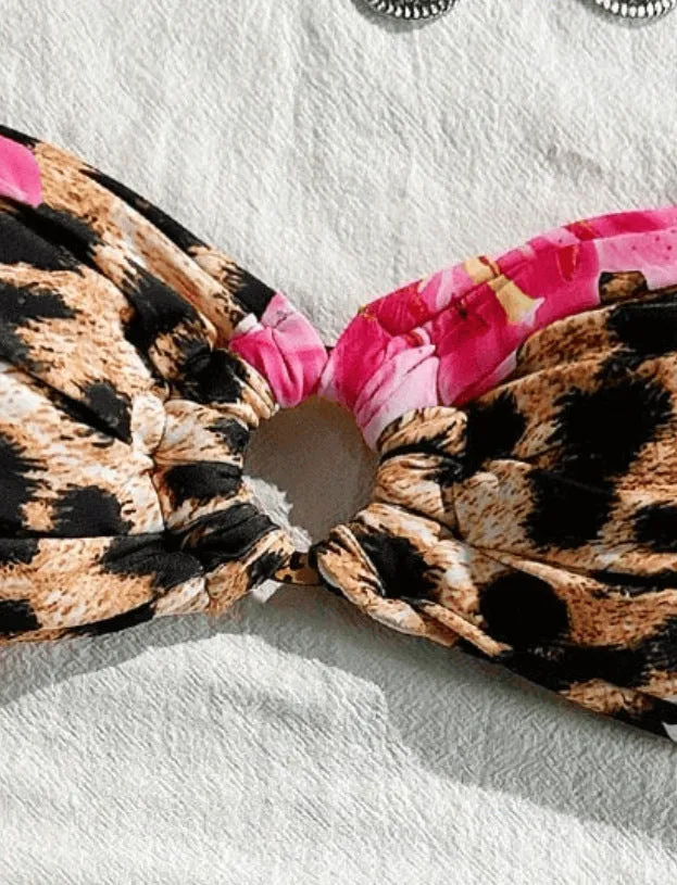 Pink leopard print women's tube top split bikini swimsuit on white background