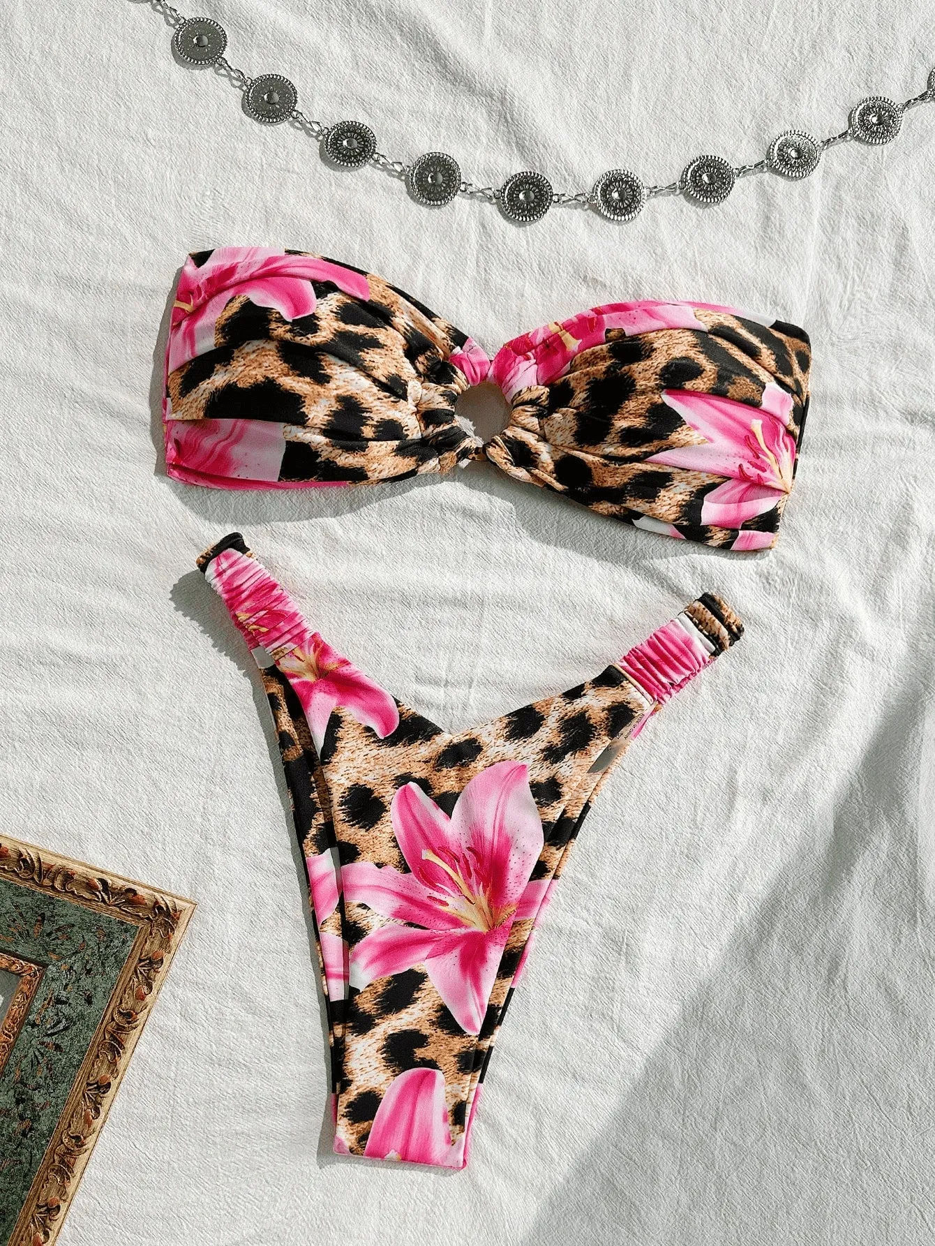 Pink leopard print women's tube top split bikini swimsuit on white background