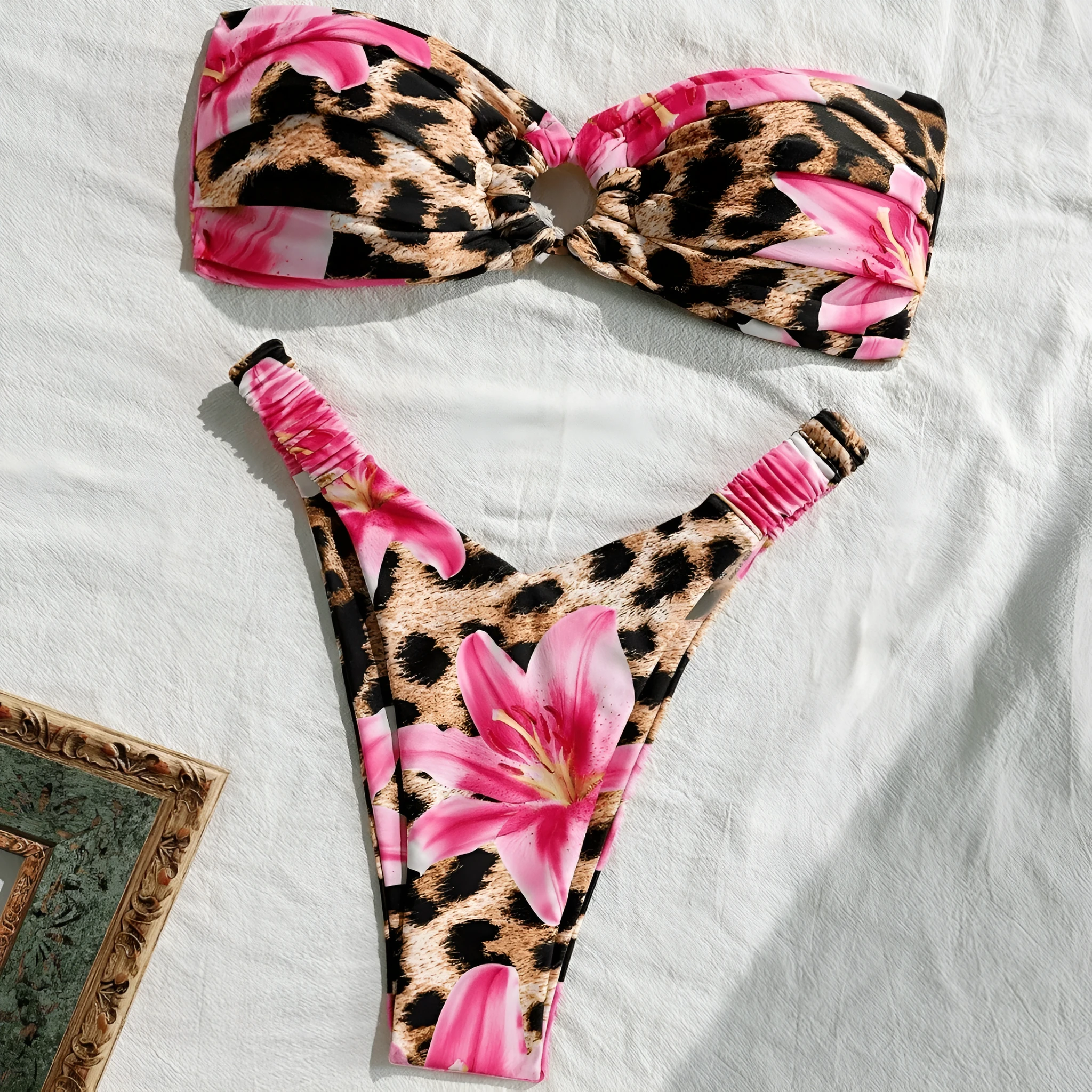 Pink leopard print women's tube top split bikini swimsuit on white background