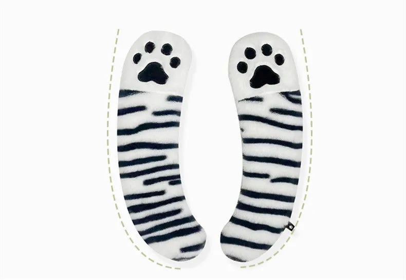 Plush toilet seat cushion with adhesive Velcro fastener in black and white stripes for bathroom use