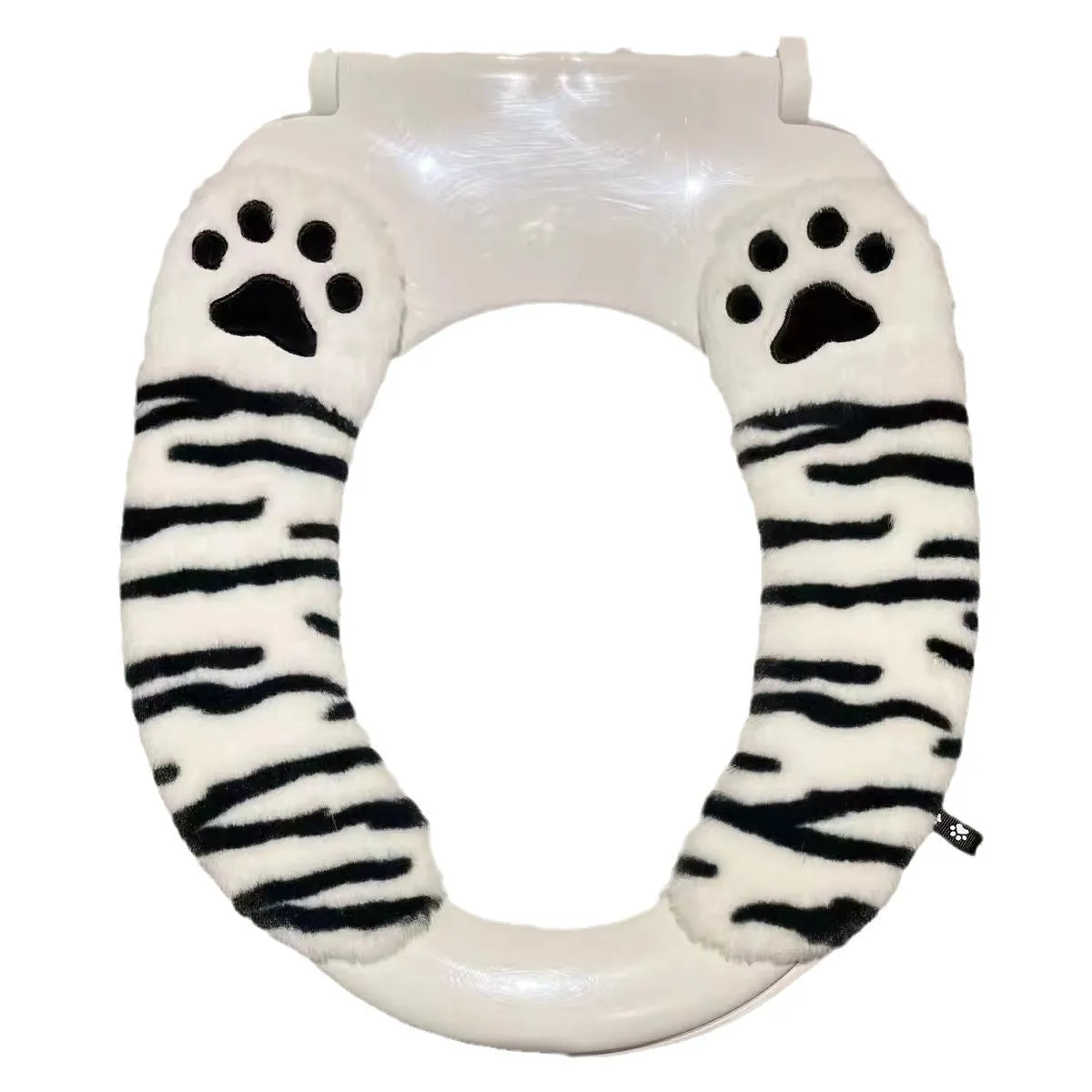 Plush toilet seat cushion with adhesive Velcro fastener in black and white stripes for bathroom use