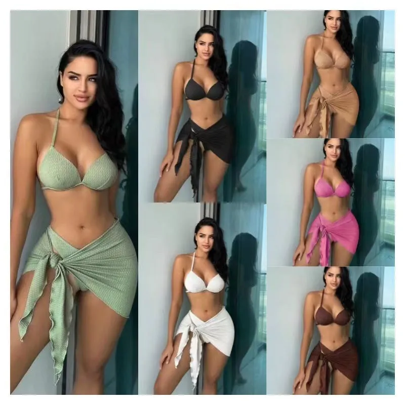 Women's three-piece swimsuit set in Russian split style, shown in a solid colour with top, panties, and skirt.