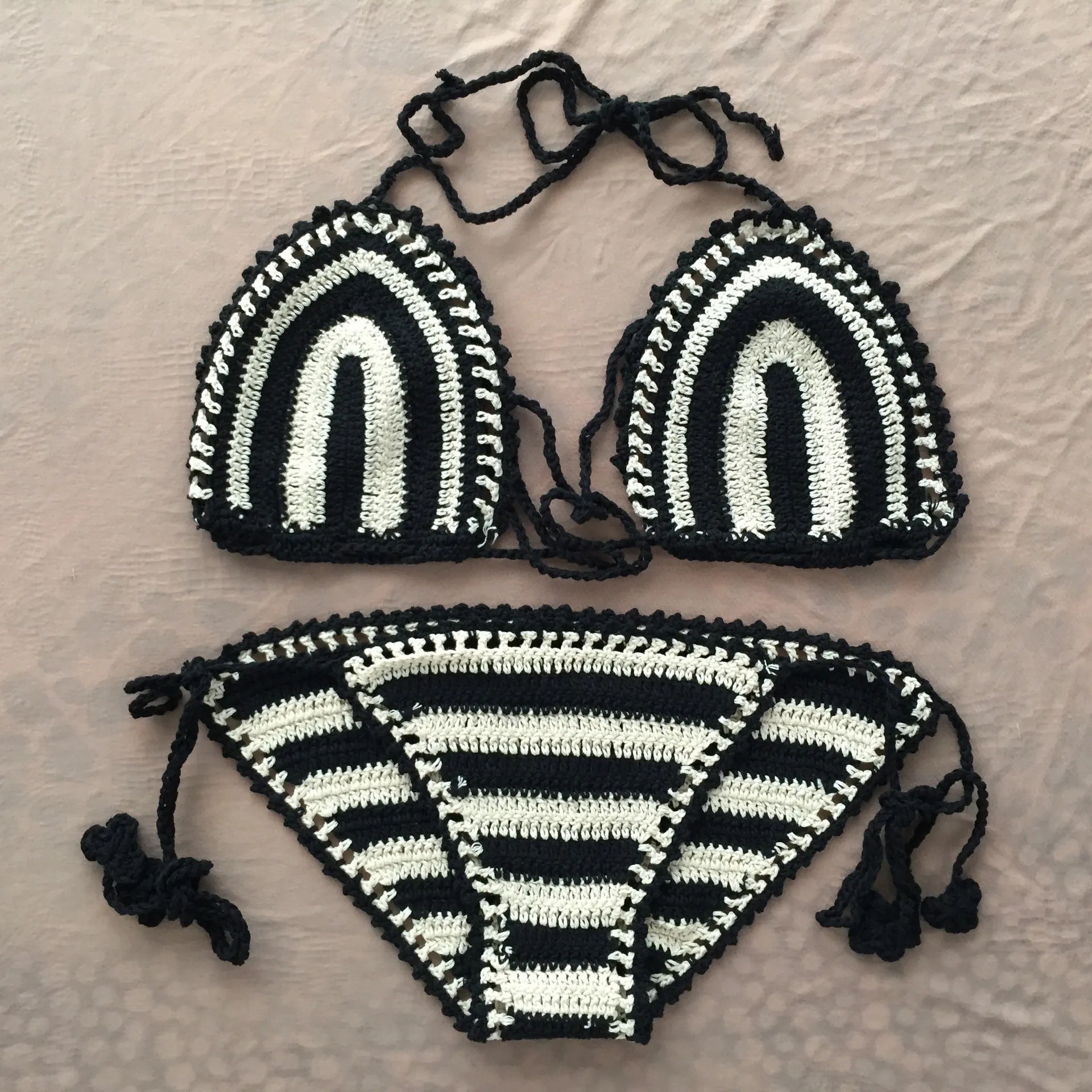 Hand crochet bikini set with cotton wrap top and woven texture on a woman by the beach