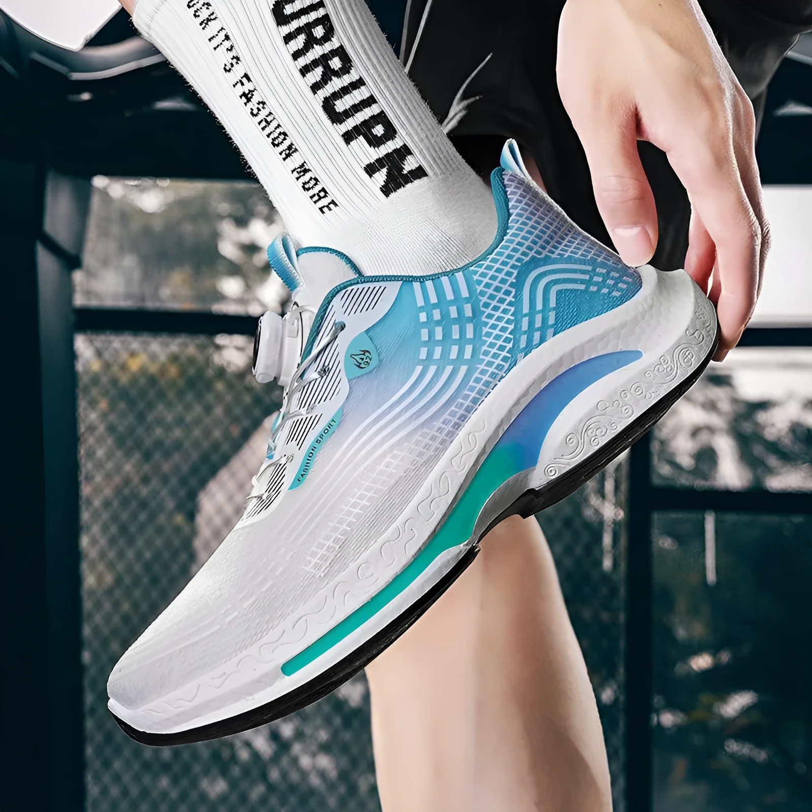 Men's low-top sneaker in mesh with a rotating buckle and rubber sole, shown in available colour options.