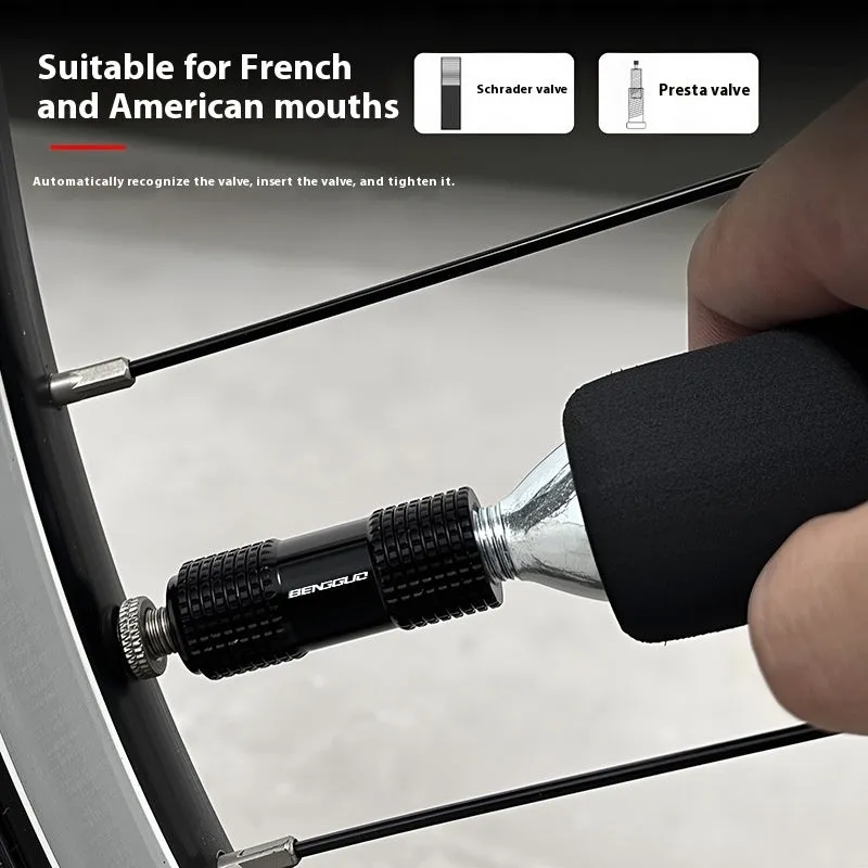 Portable air nozzle for bicycle inflation in black aluminium alloy, with fast charging pump attachment