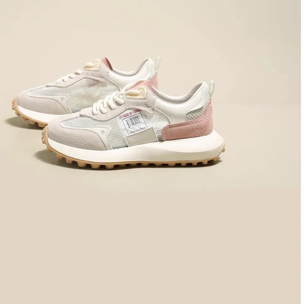 Women's grey and pink retro sneaker with low top design and round toe