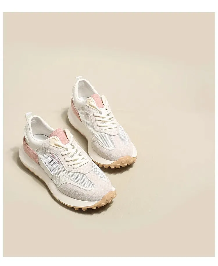 Women's grey and pink retro sneaker with low top design and round toe