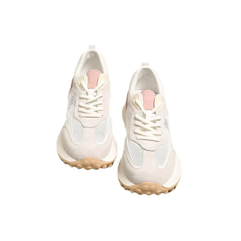 Women's grey and pink retro sneaker with low top design and round toe