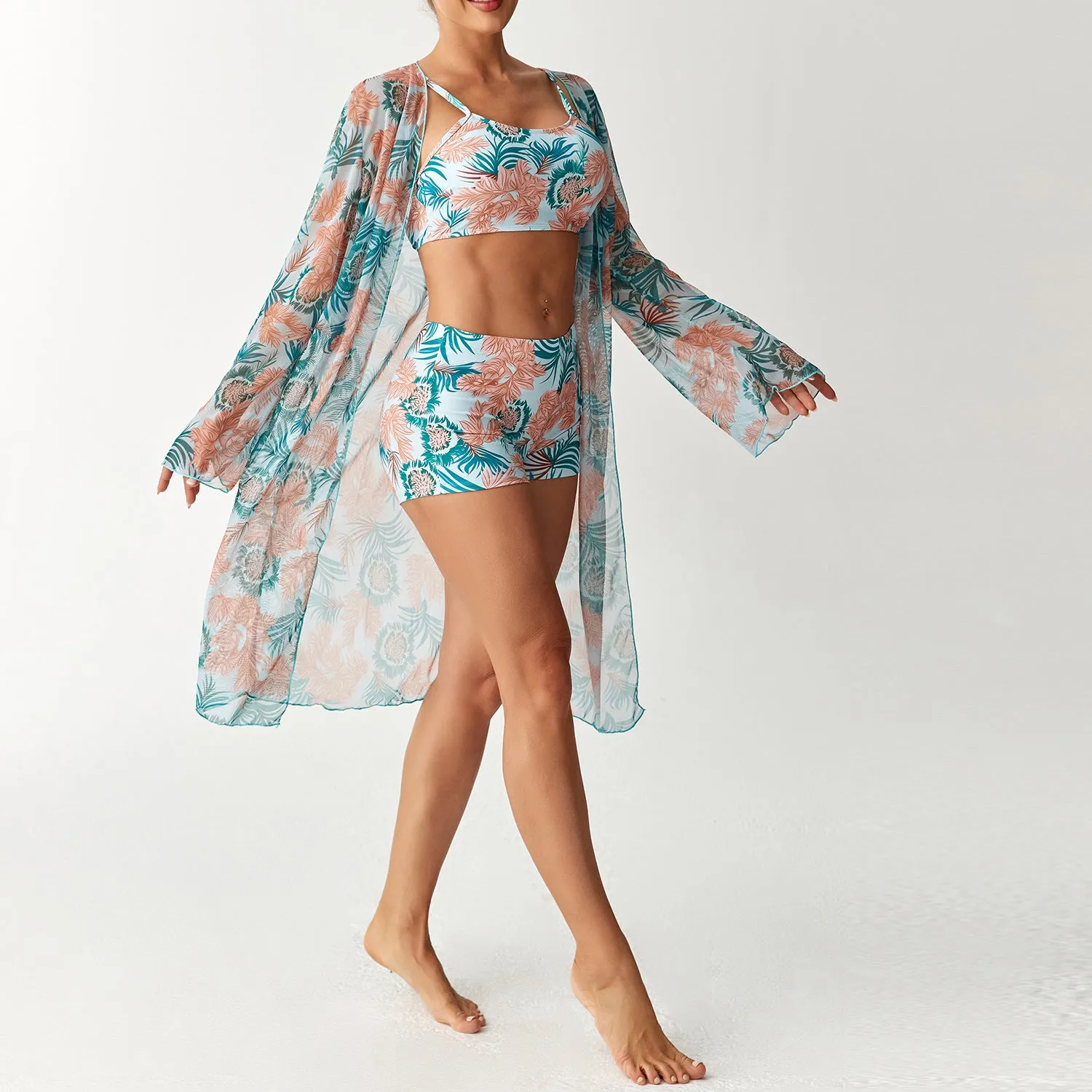 Women's three-piece swimsuit set with long sleeve blouse in pink, black, white, and sapphire blue
