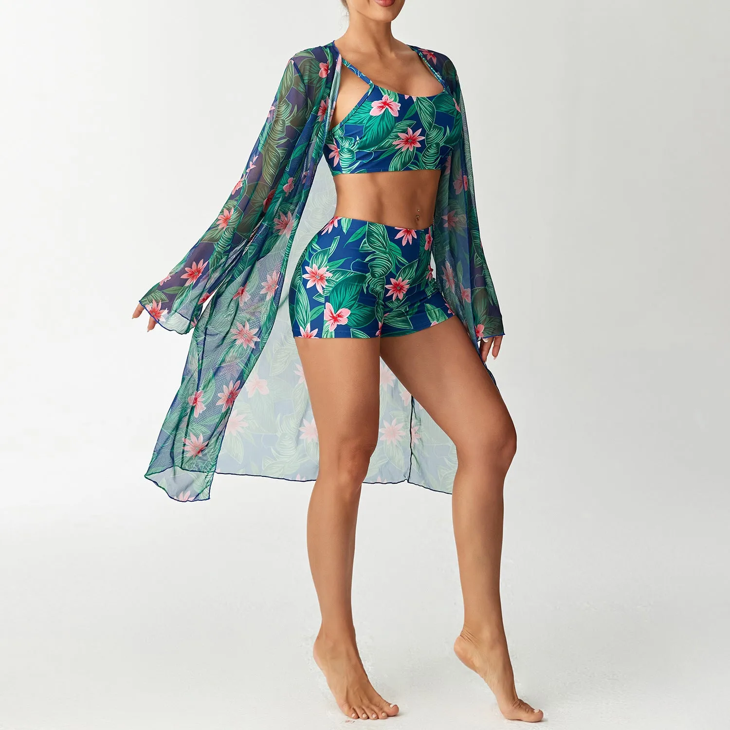 Women's three-piece swimsuit set with long sleeve blouse in pink, black, white, and sapphire blue
