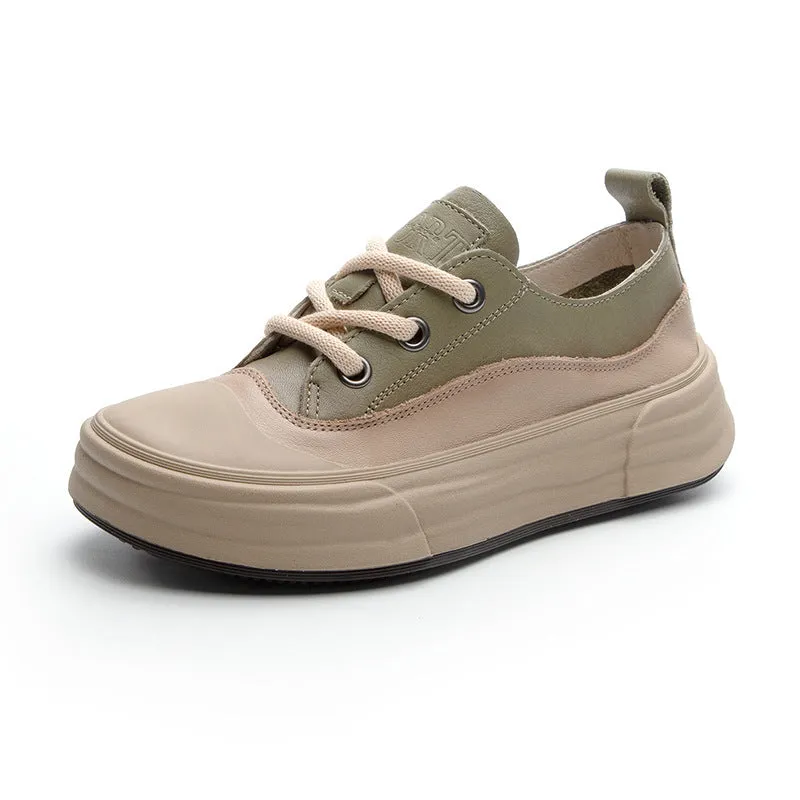 Women's matcha green leather platform sneakers with round toe and white laces on a flat sole.